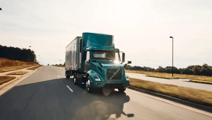 Volvo Electric VNR driving down a highway